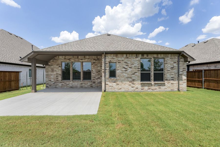 Exterior details and patio area of a home in River Ranch, Van Alstyne (Image 4). Exterior details and patio area of a home in River Ranch, Van Alstyne (Image 4).
