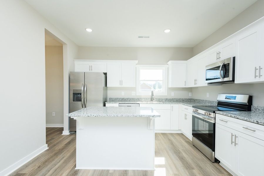 Furnished interior view inside a new home in Pallini Place, Elon (Image 5).