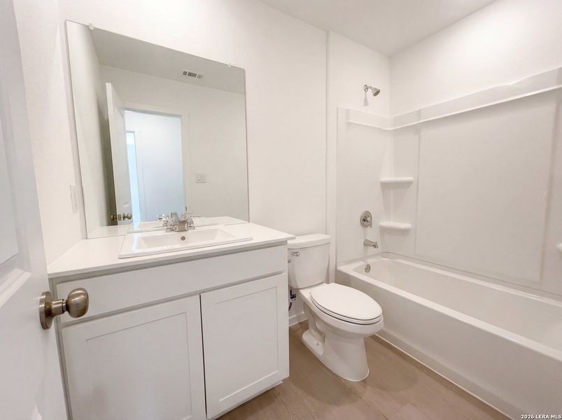 Furnished interior view inside a new home in Waters Edge, Seguin (Image 9).