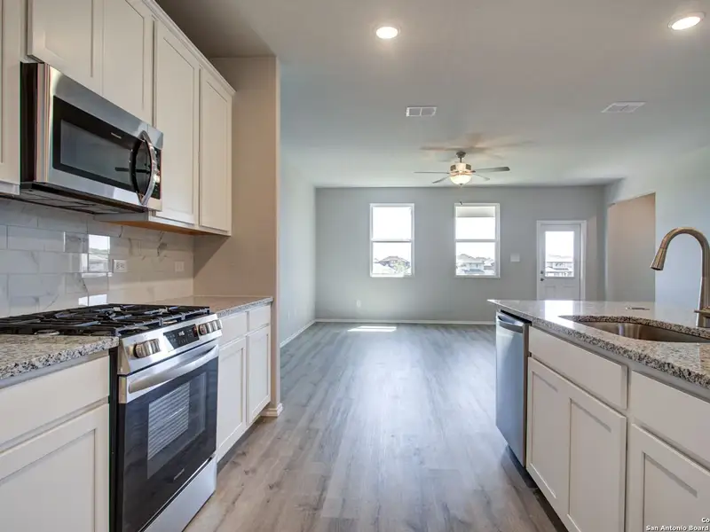 Furnished interior view inside a new home in Comanche Ridge, San Antonio (Image 9).