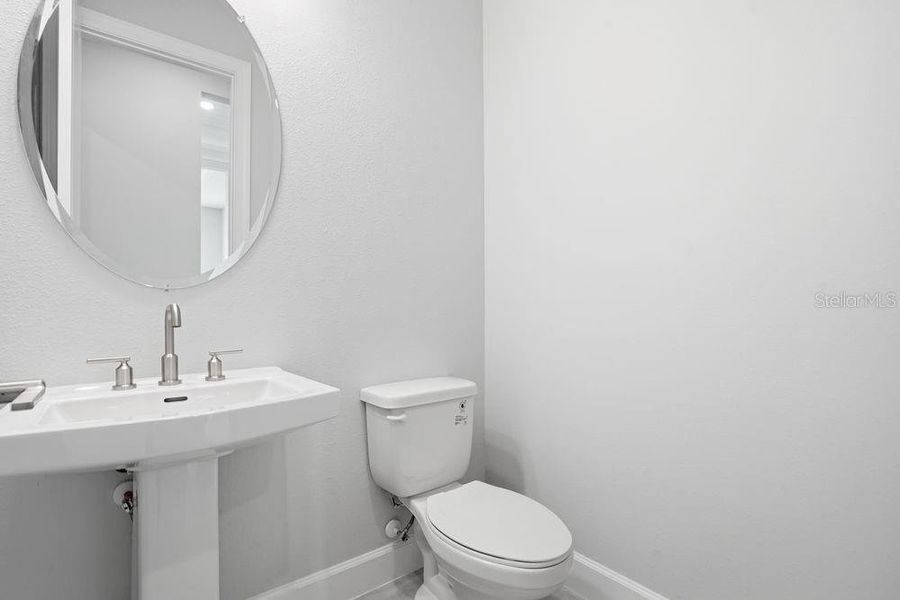 Furnished interior view inside a new home in Esplanade at Coasterra, Palmetto (Image 6).