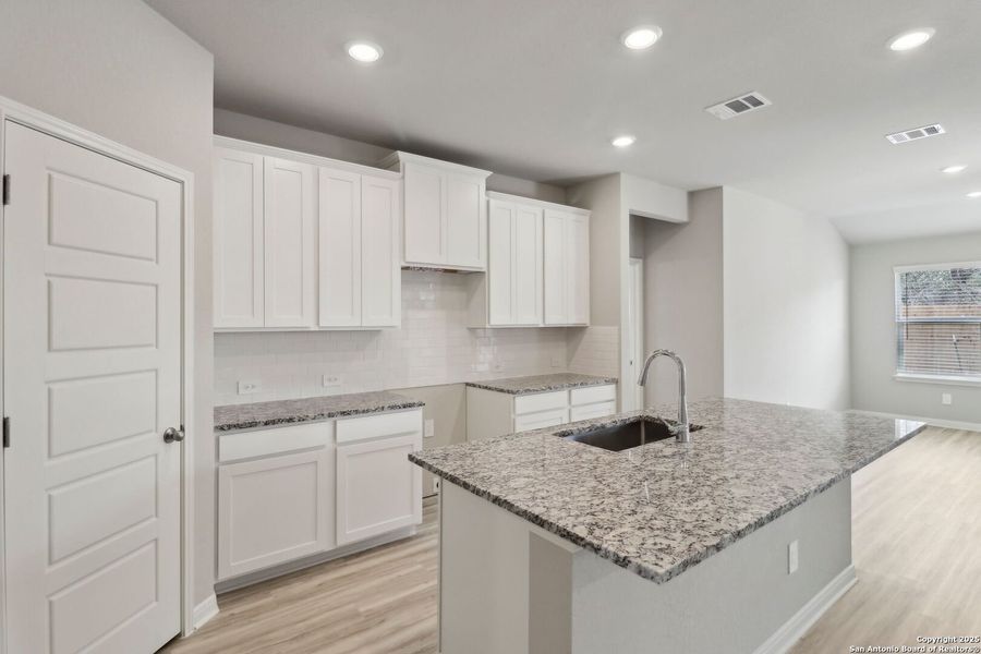 Furnished interior view inside a new home in Thomas Pond, San Antonio (Image 11).