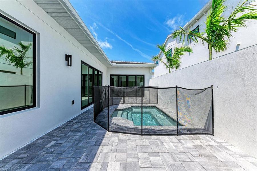 Exterior details and patio area of a home in Aqua Single Family Homes, Bradenton (Image 4).