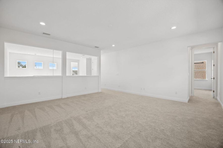 Spacious, unfurnished interior of a new home in Amelia National, Fernandina Beach (Image 21).