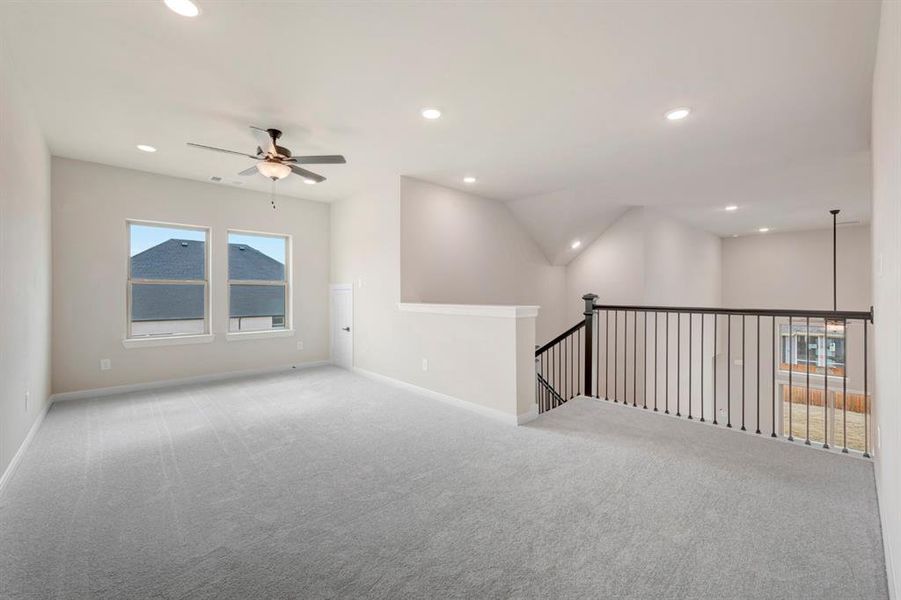 Spare room featuring a ceiling fan, carpet, and recessed lighting