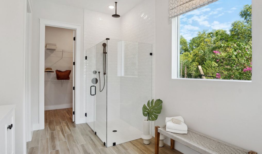 Frameless shower in primary suite