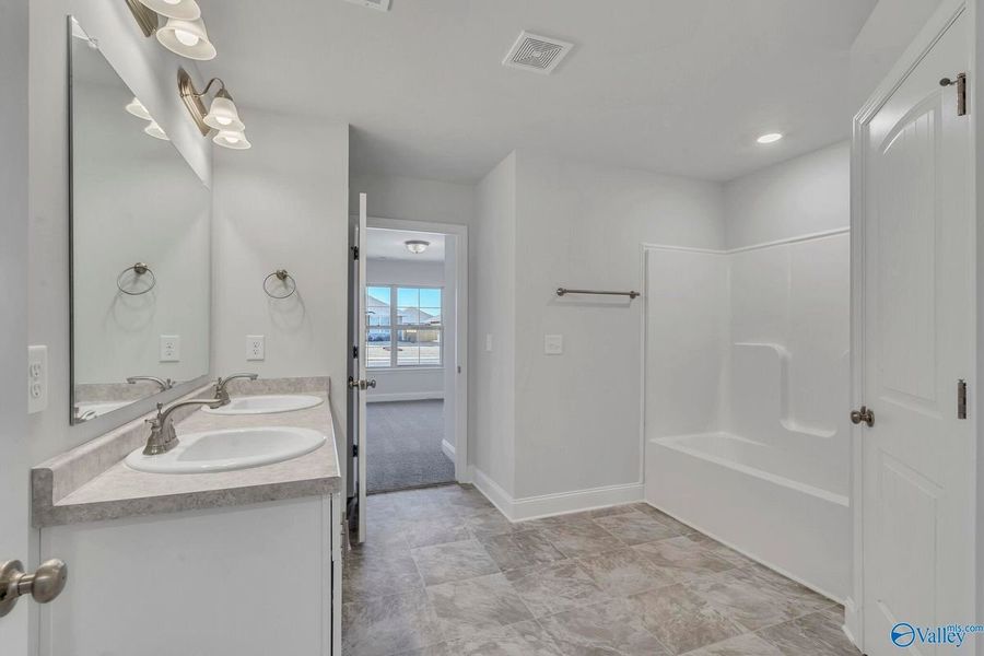 Representative furnished interior of a home built from the 2200 by Adams Homes in Winding Oaks, Weeki Wachee (Image 10). Representative furnished interior of a home built from the 2200 by Adams Homes in Winding Oaks, Weeki Wachee (Image 10).