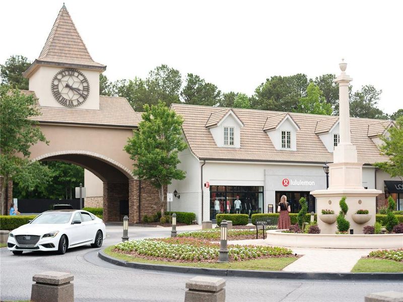 Front exterior of a new home in Knollwood, Johns Creek, GA, highlighting curb appeal (Image 31).
