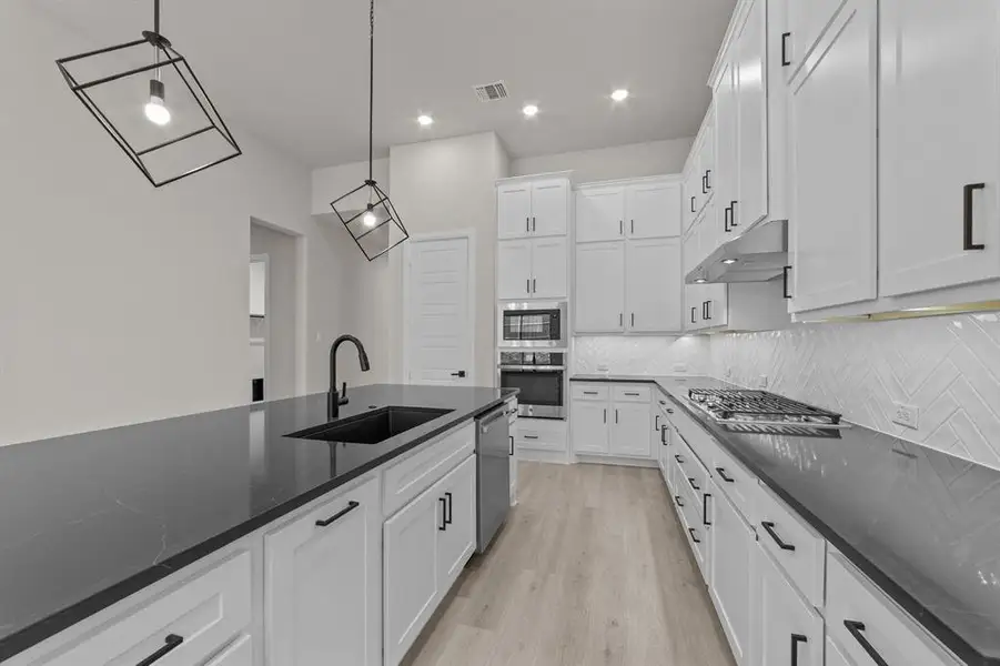 Furnished interior view inside a new home in South Pointe  Cottage Series, Mansfield (Image 7).