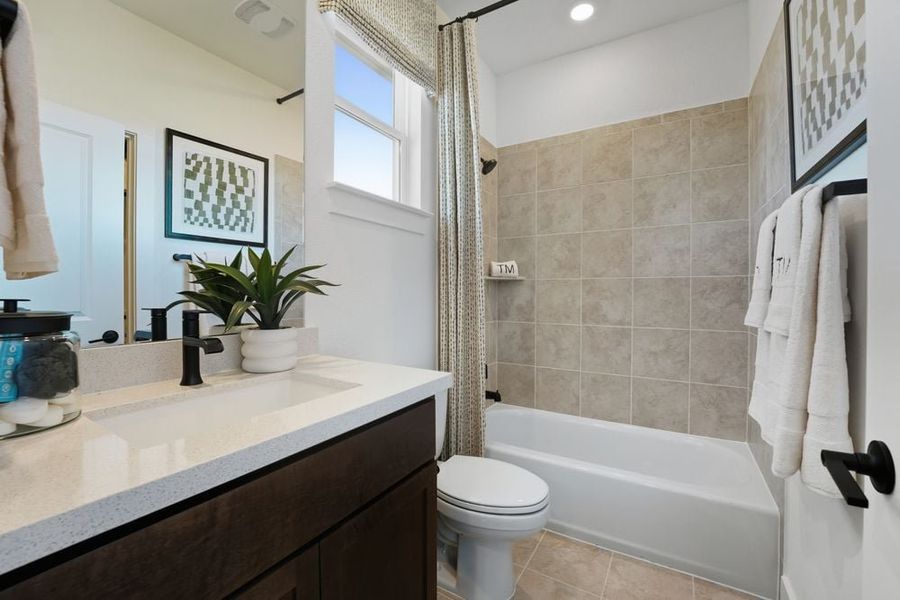 Furnished interior view inside a new home in Travisso, Leander (Image 23).