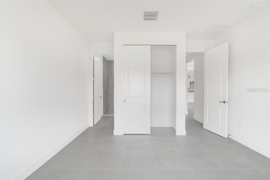 Spacious, unfurnished interior of a new home in Harvest at Ovation, Winter Garden (Image 23). Spacious, unfurnished interior of a new home in Harvest at Ovation, Winter Garden (Image 23).