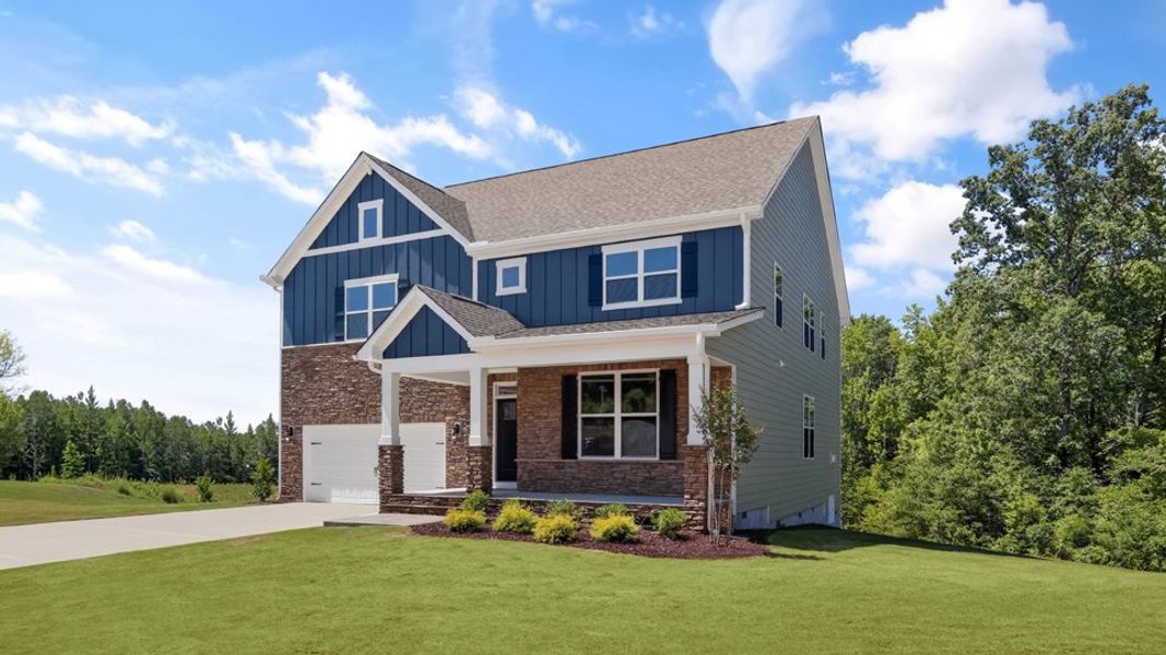 Representative exterior photo of a completed home built from the Wylie by D.R. Horton in The Grove at Winston Pointe, Clayton, NC (Image 2). Representative exterior photo of a completed home built from the Wylie by D.R. Horton in The Grove at Winston Pointe, Clayton, NC (Image 2).