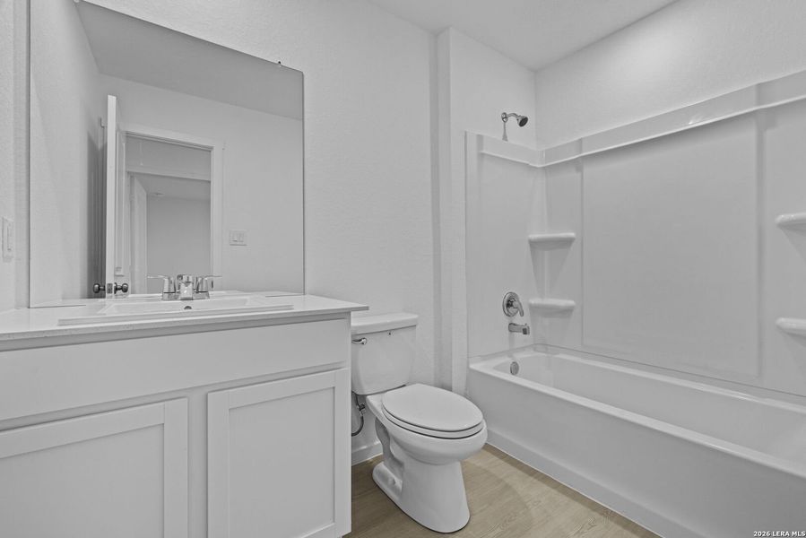 Furnished interior view inside a new home in Spring Grove, St. Hedwig (Image 7).