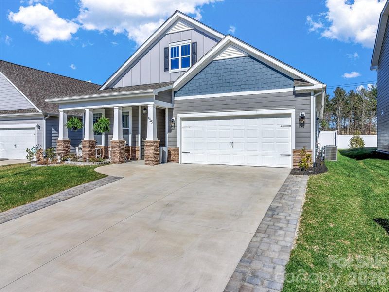 Front exterior of a new home in , Hendersonville, NC, highlighting curb appeal (Image 22).