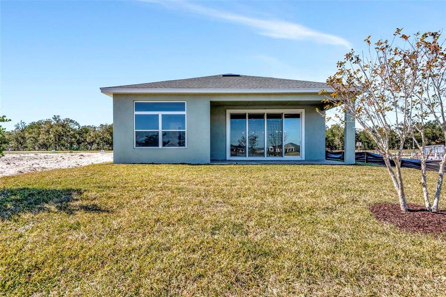 Exterior details and patio area of a home in The Reserve at Victoria, Deland (Image 24).