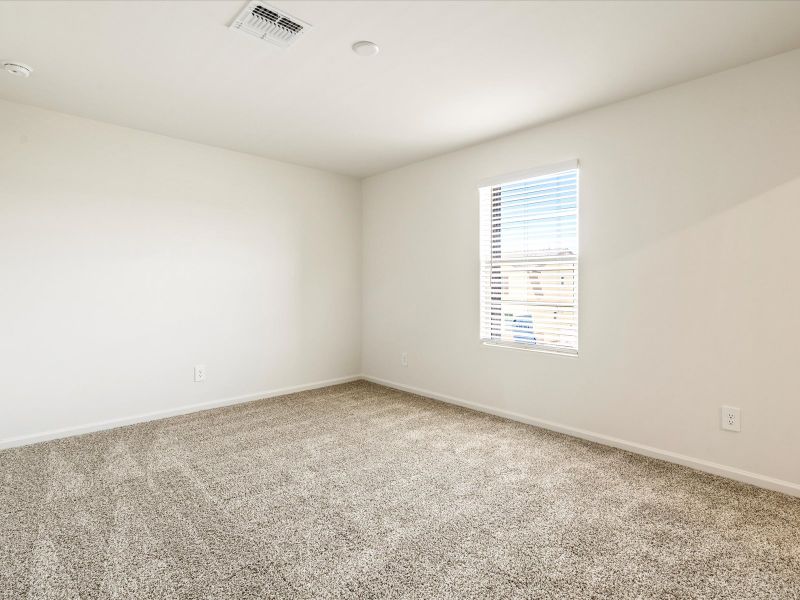 Spacious, unfurnished interior of a new home in Mandarina - Premier Series, Marana (Image 9).