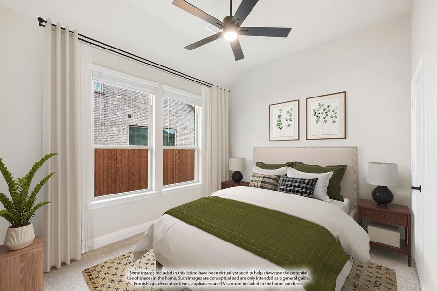 Bedroom with vaulted ceiling, ceiling fan, large windows, and queen bed with green bedding