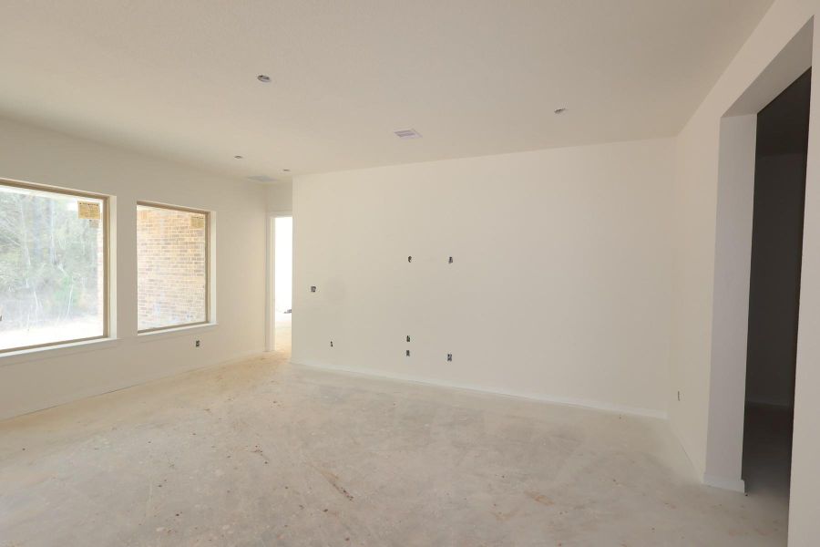 In-progress construction of a new home in Escondido 60' Homesites, Magnolia, TX (Image 4).