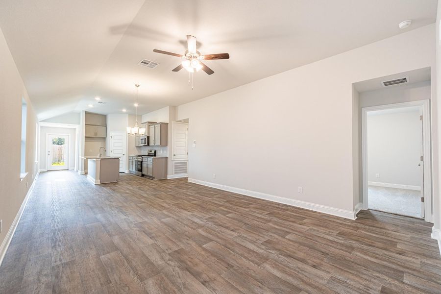 Open floorplan with hard flooring and high vaulted ceilings Open floorplan with hard flooring and high vaulted ceilings