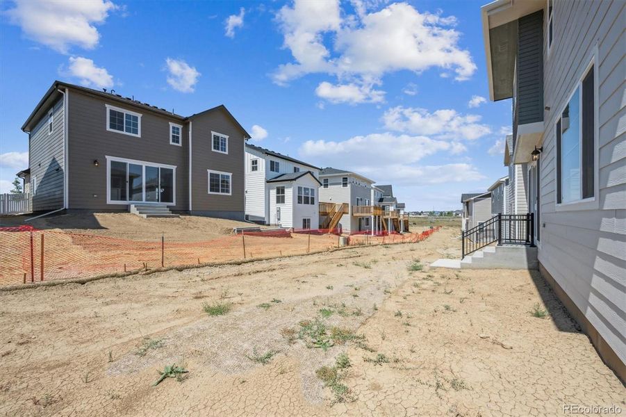Exterior details and patio area of a home in Buckley Yard, Aurora (Image 3).