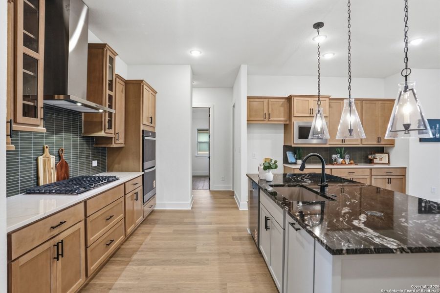 Furnished interior view inside a new home in Kinder Ranch - 70', San Antonio (Image 13).