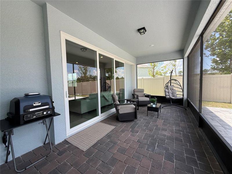 Exterior details and patio area of a home in Winding Meadows, Apopka (Image 3).