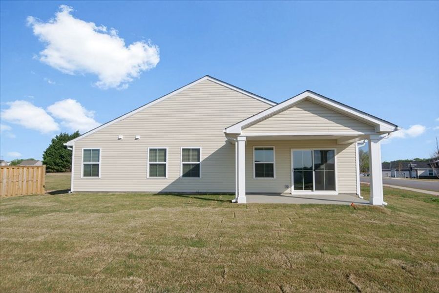 Exterior details and patio area of a home in Reidville Town Center Cottages, Duncan (Image 15).