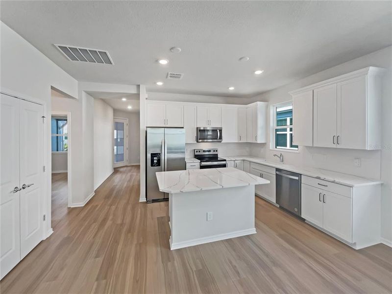 Furnished interior view inside a new home in , Kissimmee (Image 13).
