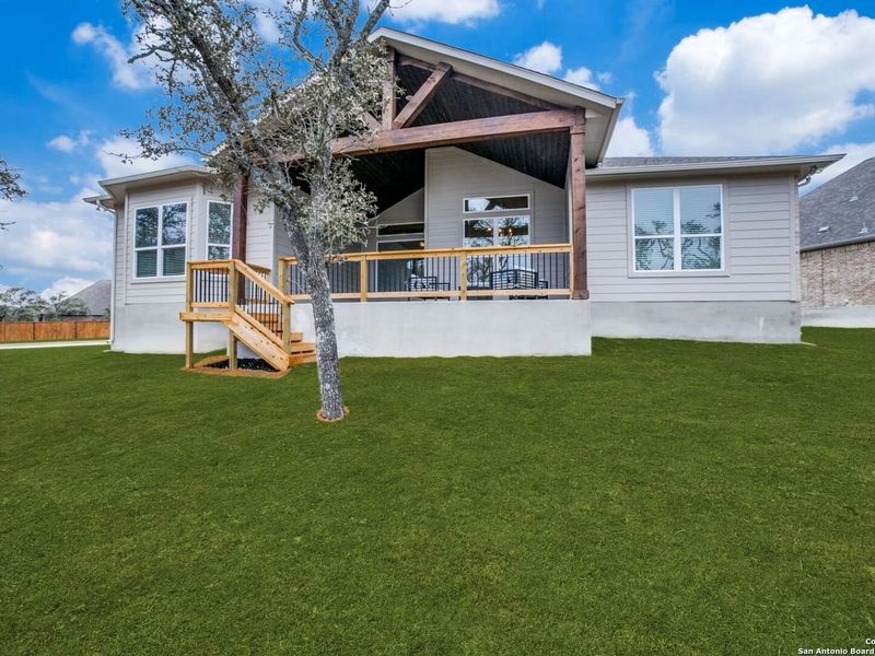Exterior details and patio area of a home in The Reserve at Potranco Oaks, Castroville (Image 4).