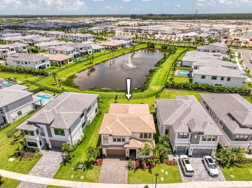 Front exterior of a new home in Apex at Avenir, Palm Beach Gardens, FL, highlighting curb appeal (Image 19).