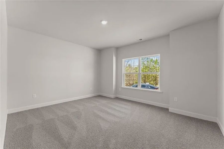 Representative unfurnished interior of a home built from the Plan 1709 by Adams Homes in Scarlett Place, Bowdon (Image 17).