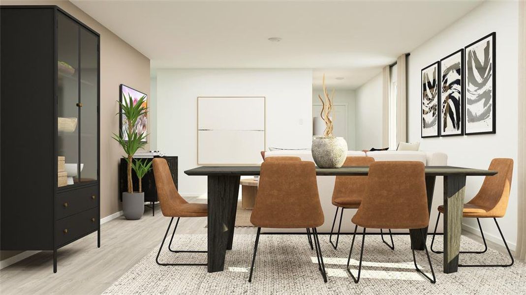Dining area featuring wood-finish flooring and a neutral color palette Dining area featuring wood-finish flooring and a neutral color palette