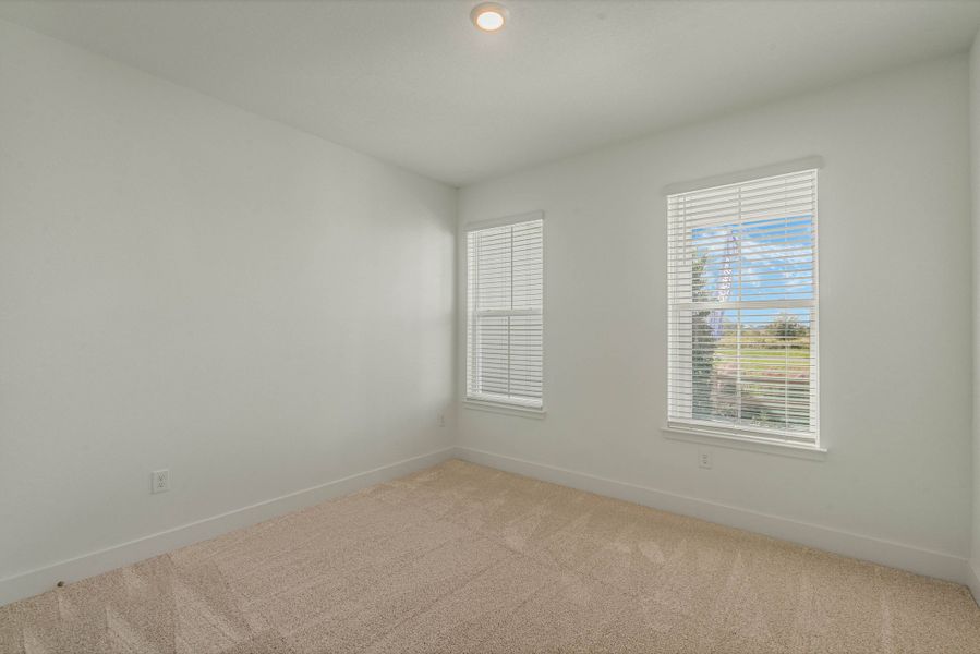 Spacious, unfurnished interior of a new home in Harvest at Ovation - Townhomes, Winter Garden (Image 16).