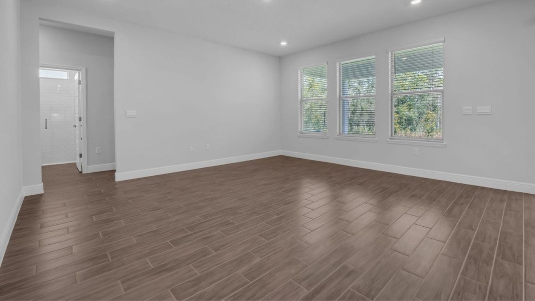 Representative unfurnished interior of a home built from the Torrey by D.R. Horton in Waterleigh, Winter Garden (Image 14).