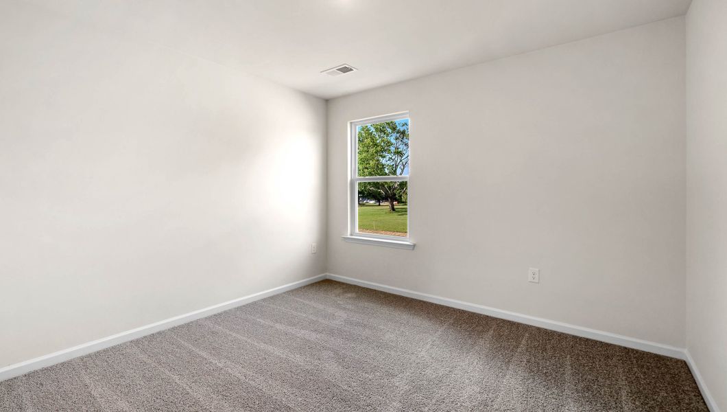 Spacious, unfurnished interior of a new home in Village Grove, Greenville (Image 25). Spacious, unfurnished interior of a new home in Village Grove, Greenville (Image 25).