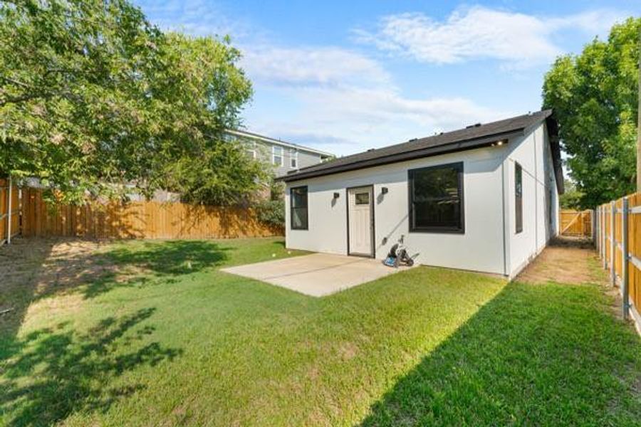 Back of property featuring a patio and a fenced backyard Back of property featuring a patio and a fenced backyard