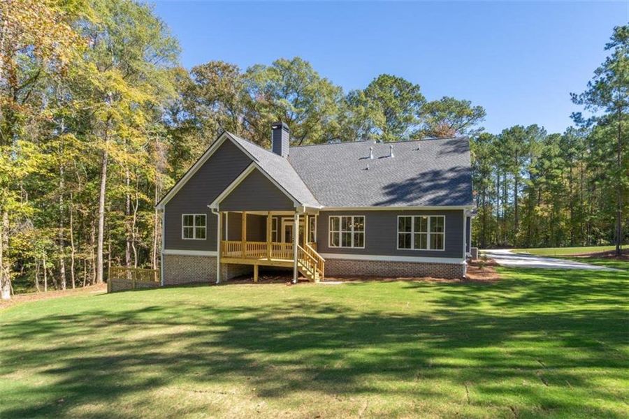 Front exterior of a new home in , Monroe, GA, highlighting curb appeal (Image 29). Front exterior of a new home in , Monroe, GA, highlighting curb appeal (Image 29).