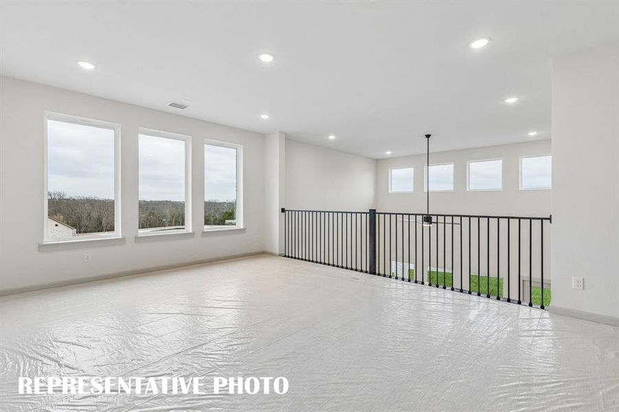 You'll enjoy hosting big game day parties or family game night in this spacious game room! REPRESENTATIVE PHOTO You'll enjoy hosting big game day parties or family game night in this spacious game room! REPRESENTATIVE PHOTO