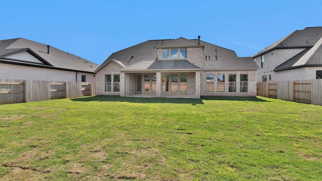 Exterior details and patio area of a home in Elyson, Katy (Image 3).