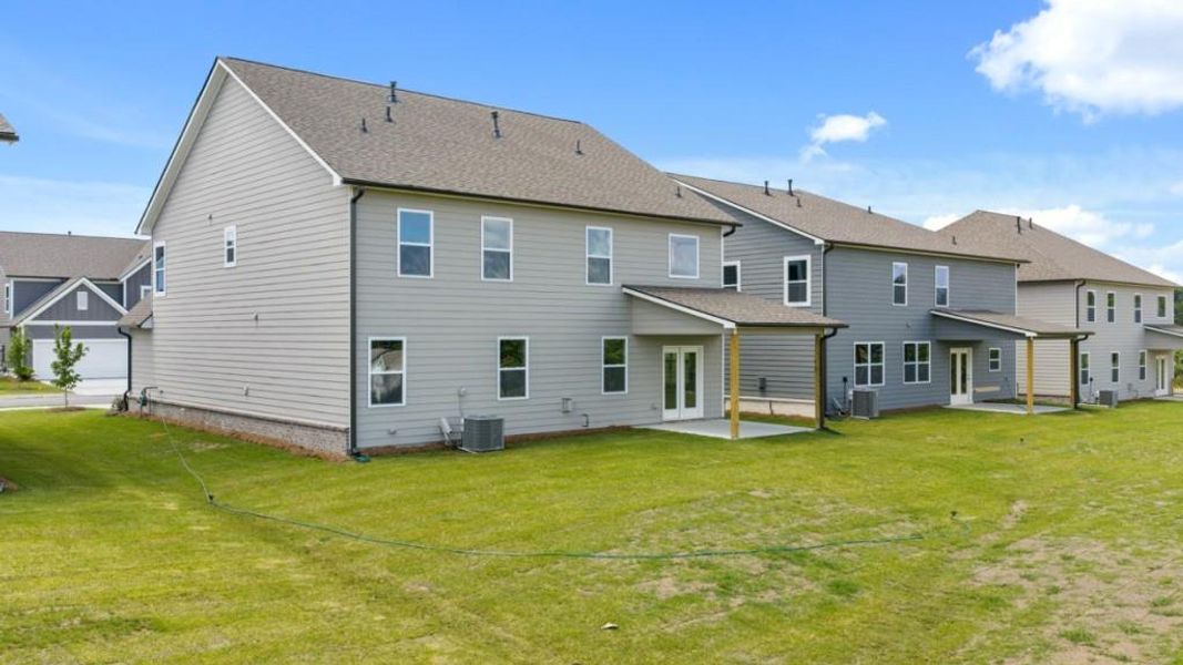 Front exterior of a new home in Hamptons at Riverwood East, Dallas, GA, highlighting curb appeal (Image 34).