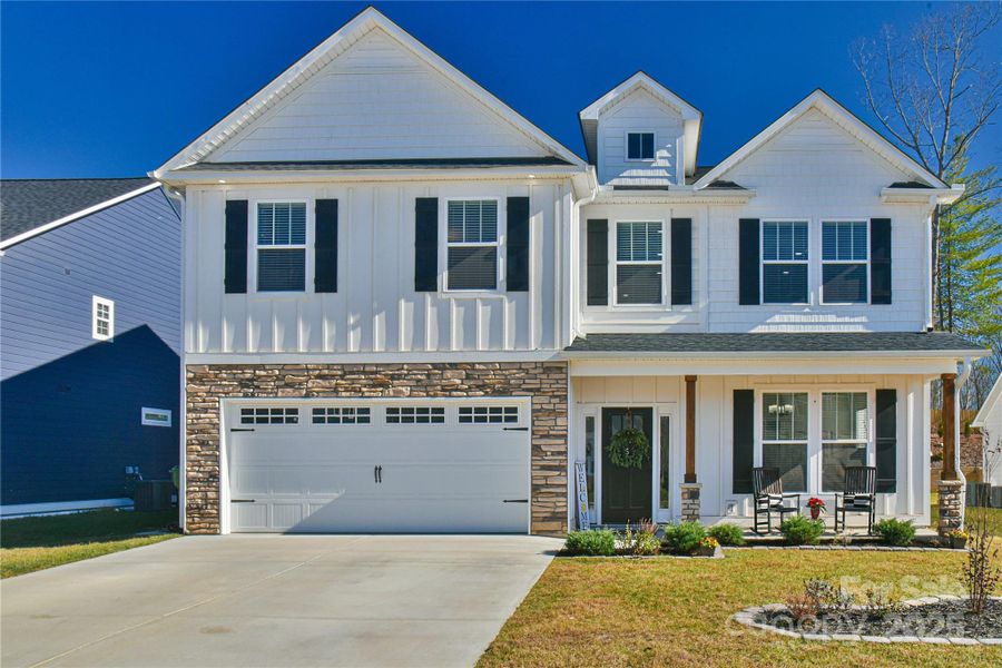 Front exterior of a new home in , Fletcher, NC, highlighting curb appeal (Image 2). Front exterior of a new home in , Fletcher, NC, highlighting curb appeal (Image 2).