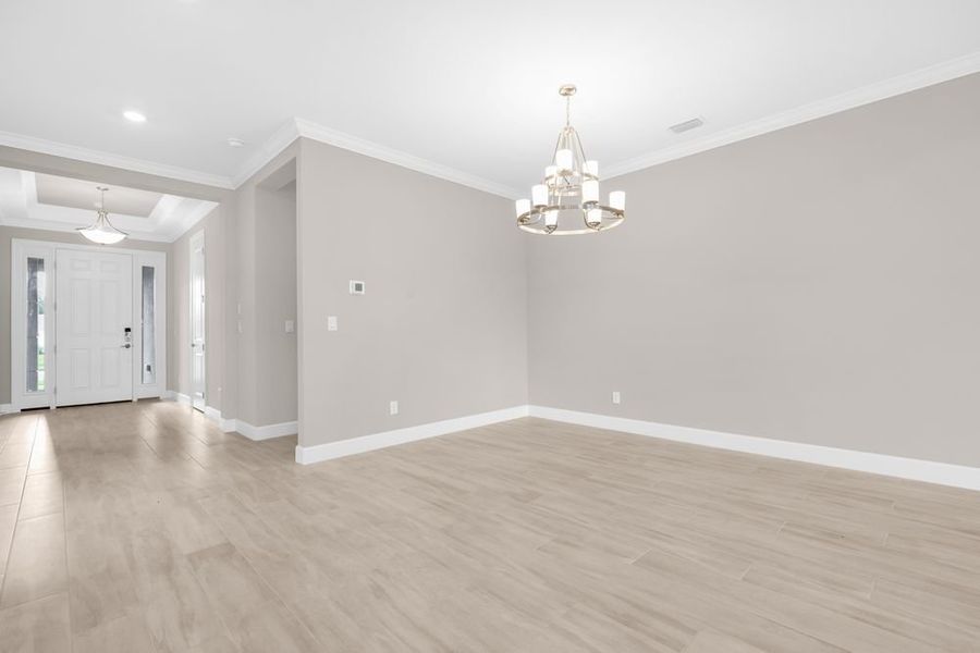 Spacious, unfurnished interior of a new home in Esplanade at Starling, Punta Gorda (Image 16).