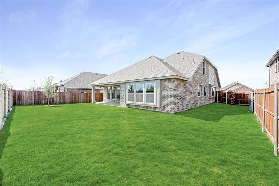 Front exterior of a new home in Arcadia Trails Classic 60, Balch Springs, TX, highlighting curb appeal (Image 25). Front exterior of a new home in Arcadia Trails Classic 60, Balch Springs, TX, highlighting curb appeal (Image 25).