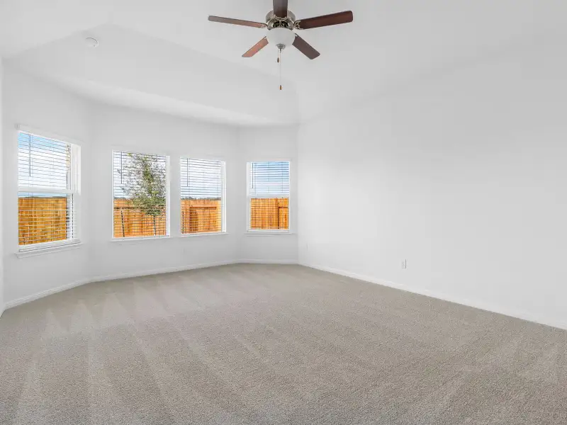 Spacious, unfurnished interior of a new home in Colony at Cole Springs - Boulevard Collection, Buda (Image 12).