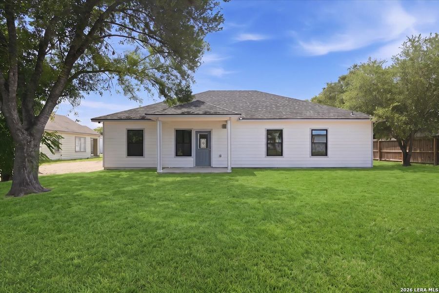 Exterior details and patio area of a home in , Beeville (Image 3).