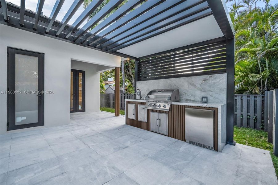 Exterior details and patio area of a home in , Miami Shores (Image 31).