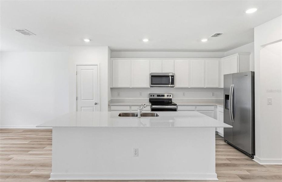 Furnished interior view inside a new home in Oakfield Lakes, Parrish (Image 3).