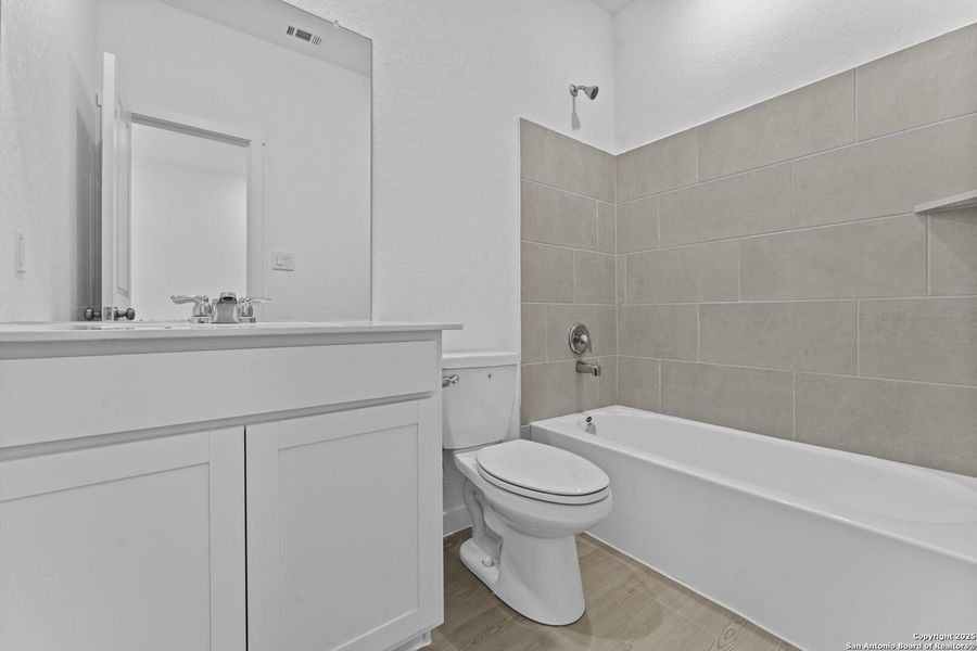 Furnished interior view inside a new home in , New Braunfels (Image 8).