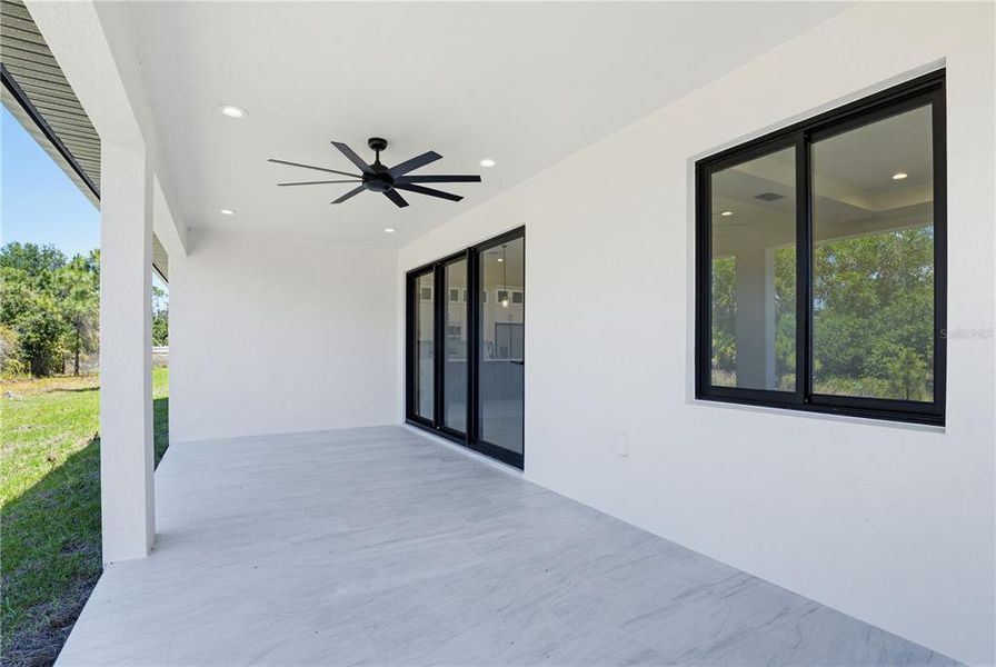 Exterior details and patio area of a home in , North Port (Image 31).