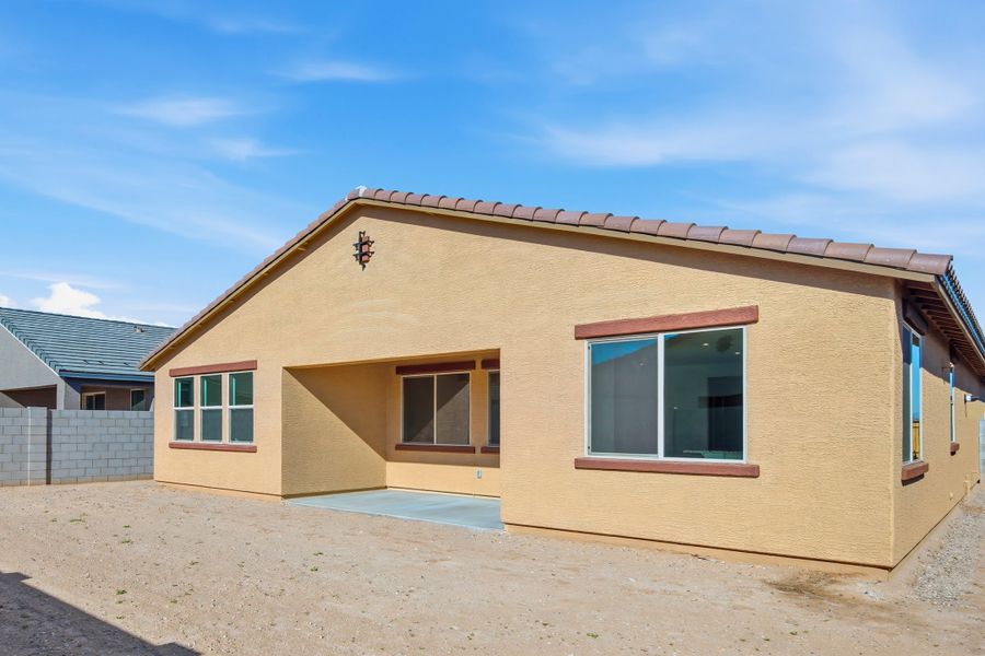 Exterior details and patio area of a home in Marbella at Windrose, Waddell (Image 3).